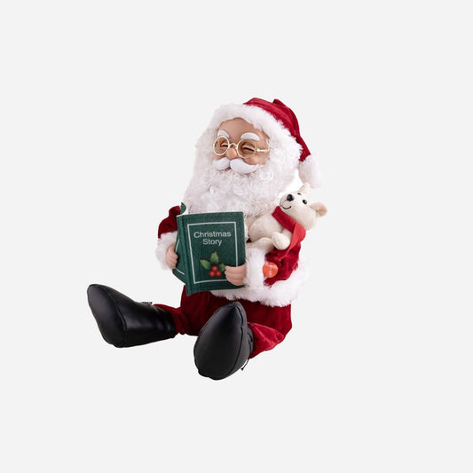 Pére Noël assis avec peluche et livre sonore et motorisé 35 cm