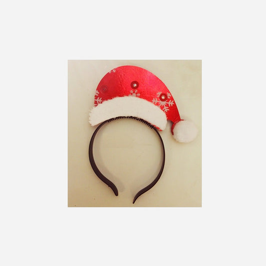 Serre-tête lumineux LED's bonnet de noël rouge