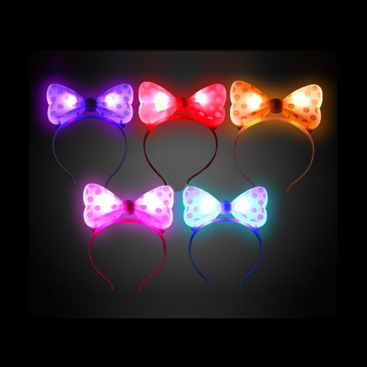 Serre-tête lumineux noeud papillon à pois assorti